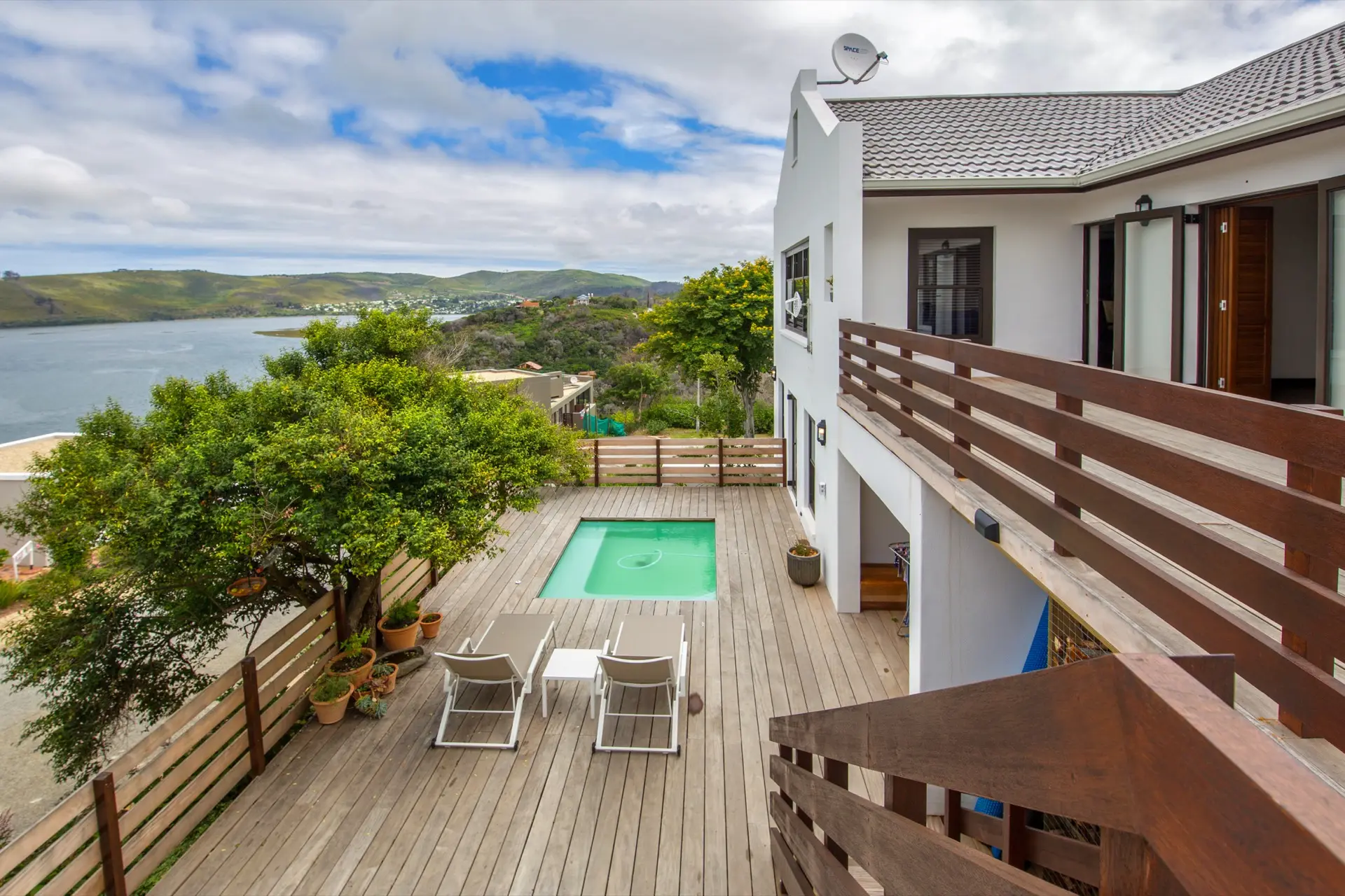 House rebuild after the 2017 Knysna fire, overlooking Knysna Lagoon — RVR Building Projects